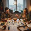 Four people gathered around a table playing tabletop role-playing games with a set of blue dice and game components.