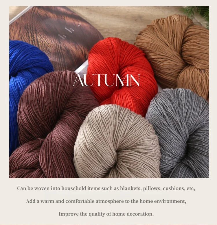 A collection of various colored yarn skeins in shades of brown, red, blue, and gray for knitting projects.
