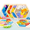 A collection of wooden 3D jigsaw puzzles featuring various animal shapes and colors for children.