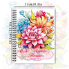 A spiral-bound colouring book featuring detailed floral illustrations and a decorative title.