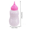 A clear plastic bottle with a pink cap and a purple feeding nipple, used as a doll feeding accessory.