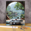 A paint by numbers kit featuring a flower field and wooden house landscape painting displayed in a circular frame.