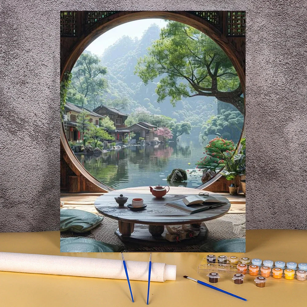 A paint by numbers kit featuring a flower field and wooden house landscape painting displayed in a circular frame.