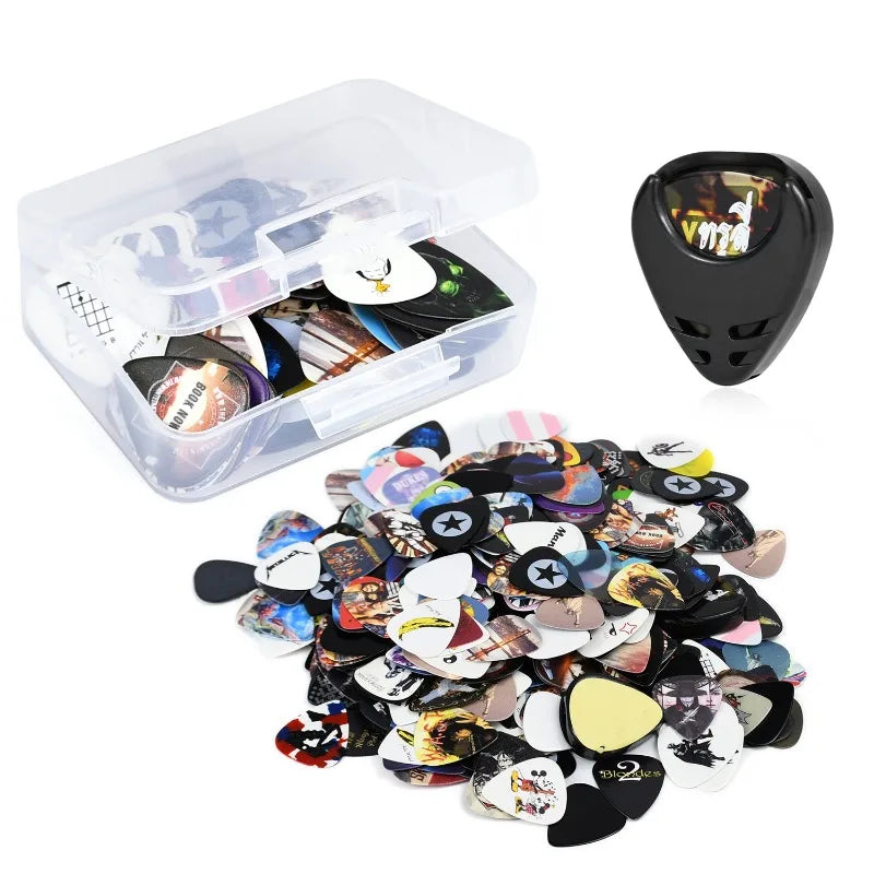 A clear plastic case holding numerous guitar picks in assorted thicknesses with a leather holder.