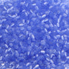 A close-up view of a mix of small, iridescent blue glass beads for jewelry making.
