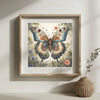 A framed watercolor painting of a butterfly in various shades of blue, green, and orange flowers.