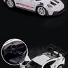A white Porsche 911 GT3 RS diecast model car is shown from the front and interior view.