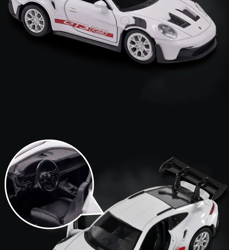 A white Porsche 911 GT3 RS diecast model car is shown from the front and interior view.