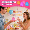 A man and a woman are celebrating a birthday with colorful squishy stress balls and balloons.