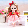 A 17cm articulated princess doll with long brown hair and a pink checkered dress and red top.