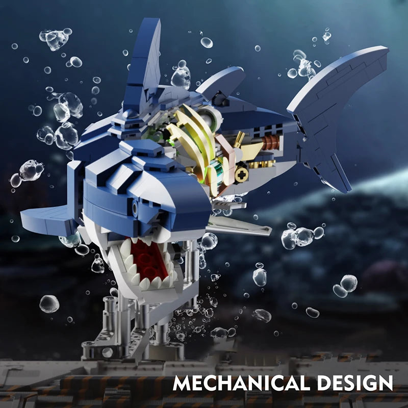 A detailed mechanical shark model built from blue and white building blocks, surrounded by floating water droplets.