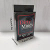 A box of the Dirty Minds party card game featuring a red and black design.