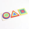 A wooden geometric shape sorter puzzle featuring colored circles and triangles.