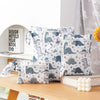 A pack of three waterproof wet and dry bags featuring dinosaur patterns for swimsuits, diapers, and travel items.