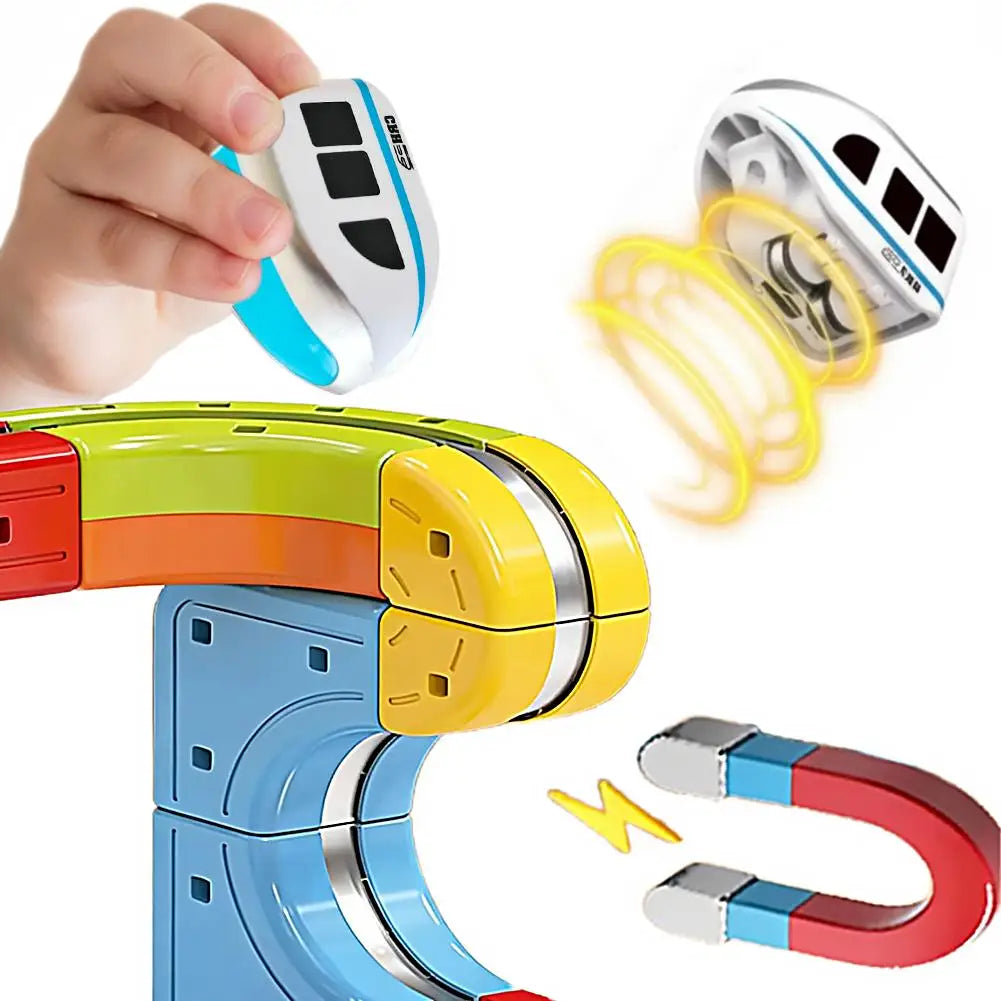 A hand holds a white and blue anti-gravity magnetic mini train toy with yellow coiled wires and a blue and yellow train body.