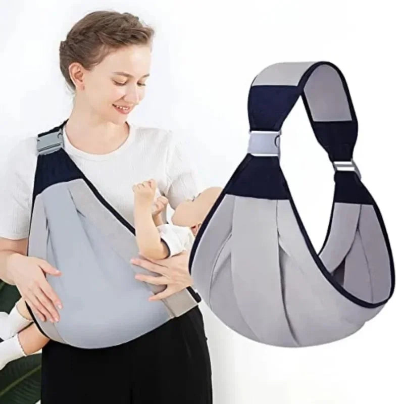 A woman is demonstrating an adjustable cotton ring sling baby carrier to a baby.