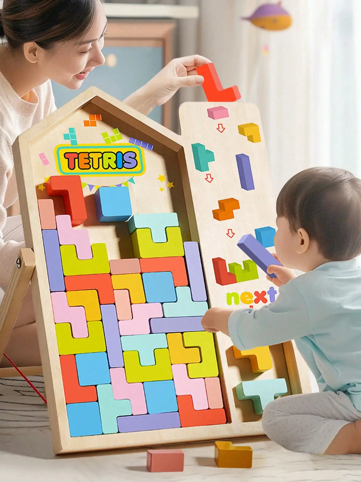 A child and an adult are playing with a wooden Tetris puzzle set, assembling colorful blocks.
