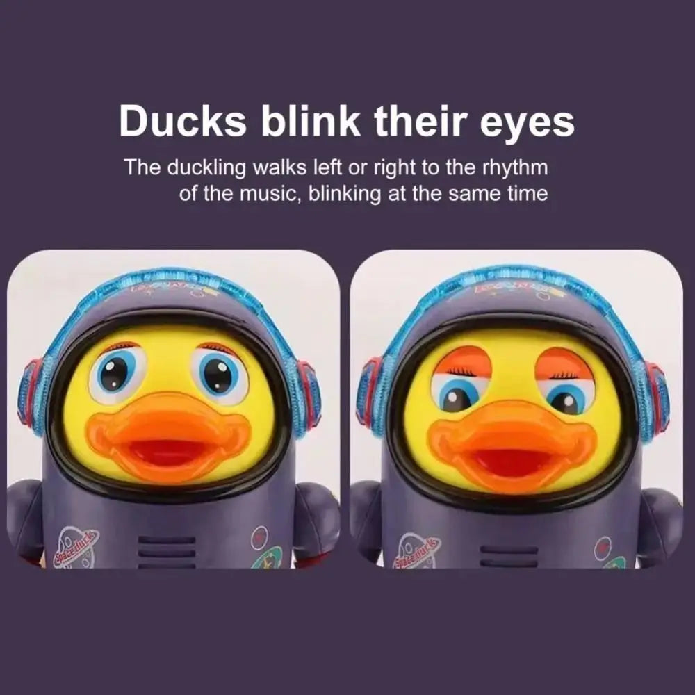 A close-up of an interactive dancing space duck toy with bright yellow features and purple accents.