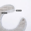 A close-up view of a gray soft cotton baby bib with an adjustable snap closure and various size options indicated.