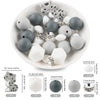 A white bowl filled with various gray and white silicone beads shaped like cartoon animals for DIY jewelry making