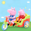 A pink piggy ride-on toy car with a pink pig figure is shown outdoors on green grass.