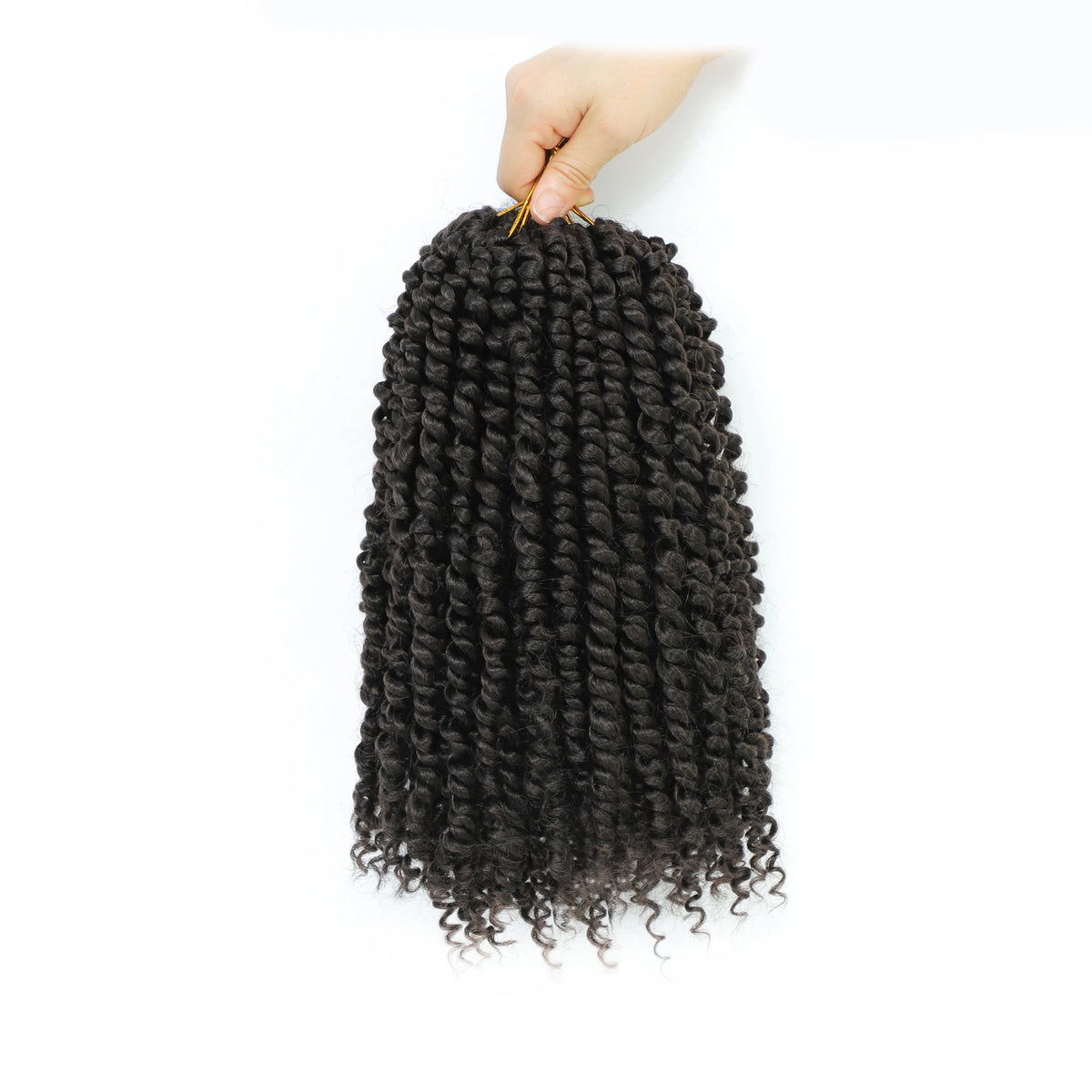 A hand is holding a bundle of black pre-looped passion twist crochet hair