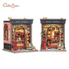 A detailed 3D wooden book nook kit featuring a Jack's Bookery storefront with interior shelves and lighting.
