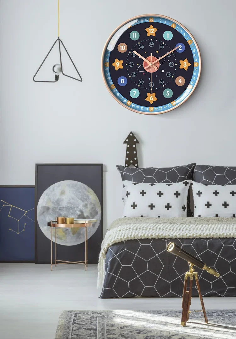 A round wall clock with a dark background and colorful markings, displayed above a modern bed.