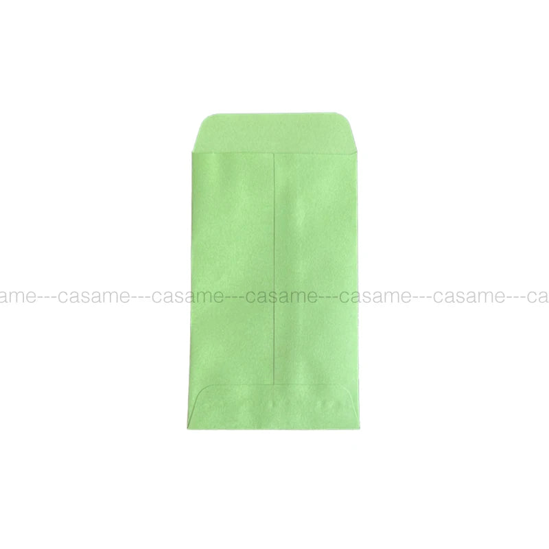 A light green mini kraft paper gift bag for party favors or weddings.