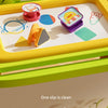 A magnetic painting board for kids with a green animal figure and various colorful magnetic shapes.