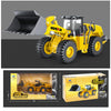 Yellow HULNA die-cast toy excavator construction vehicle with a shovel in a side view.