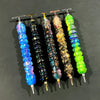 Five colorful diamond painting pens with stainless steel tips arranged in a row.