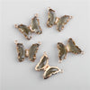 Gold-toned crystal butterfly charm beads used for jewelry making