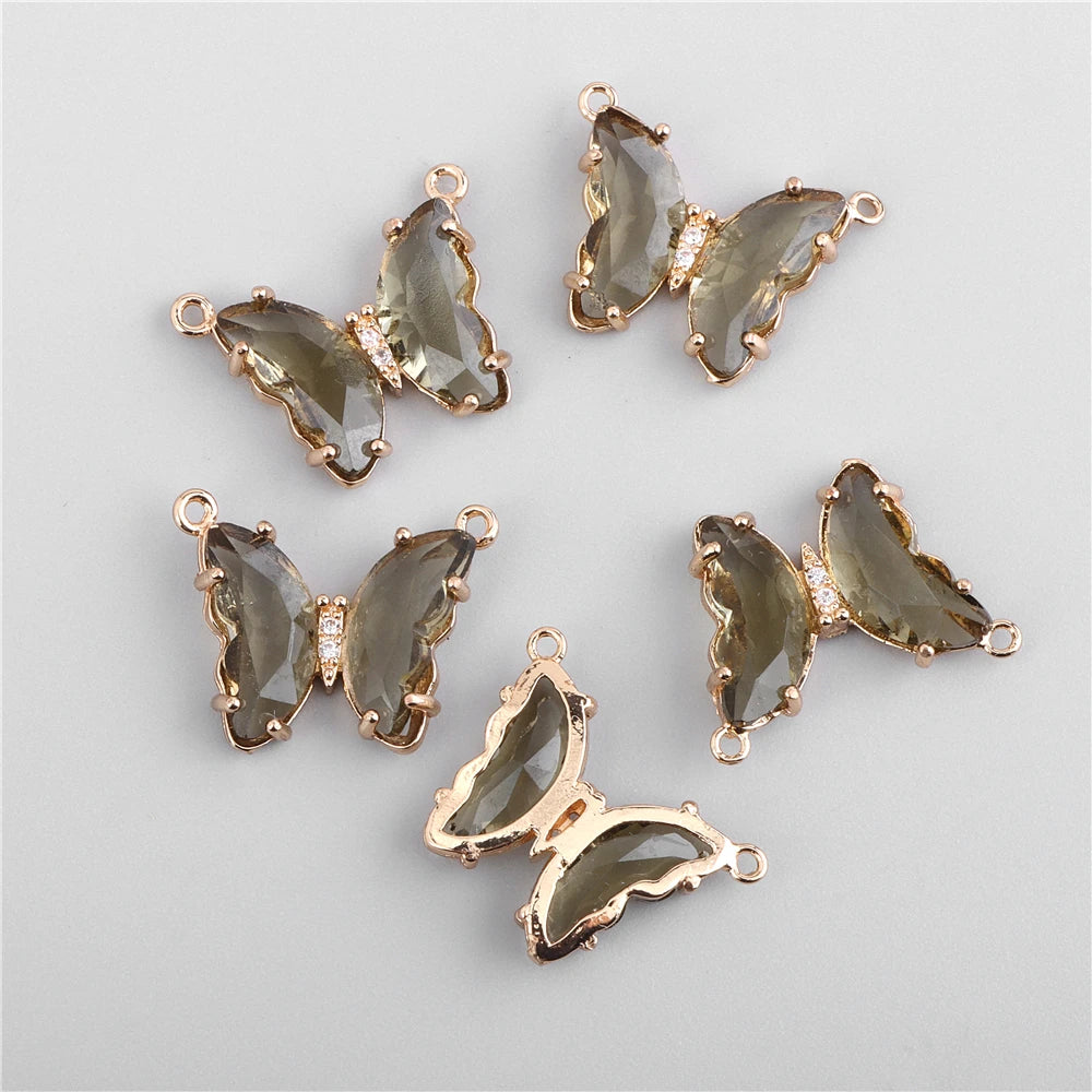 Gold-toned crystal butterfly charm beads used for jewelry making