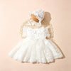 A white lace tulle dress for a newborn baby girl with a matching lace bonnet, displayed on a light background.