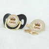 Personalized rose gold crown pacifier and clip set featuring a pearl and diamond design