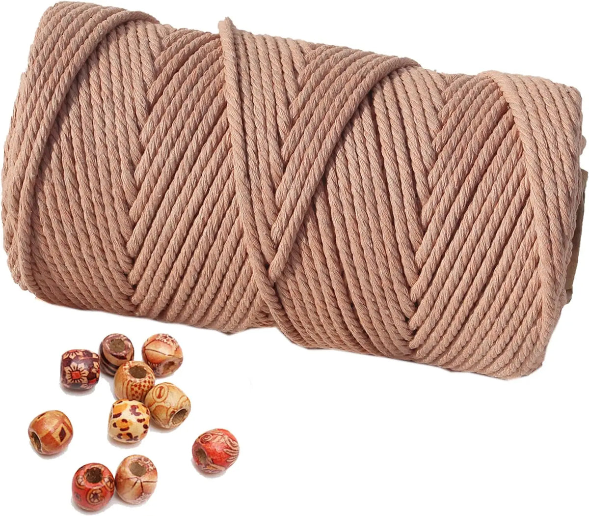 A skein of natural beige cotton macrame rope with decorative wooden beads scattered below.