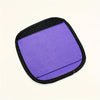 A purple neoprene luggage handle cover with a black cushioned grip.