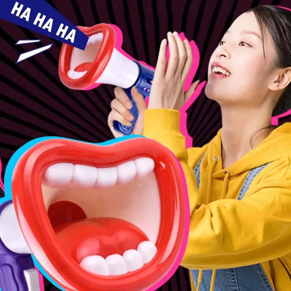 A young girl is playing with a red and white megaphone toy, showing her smiling face.