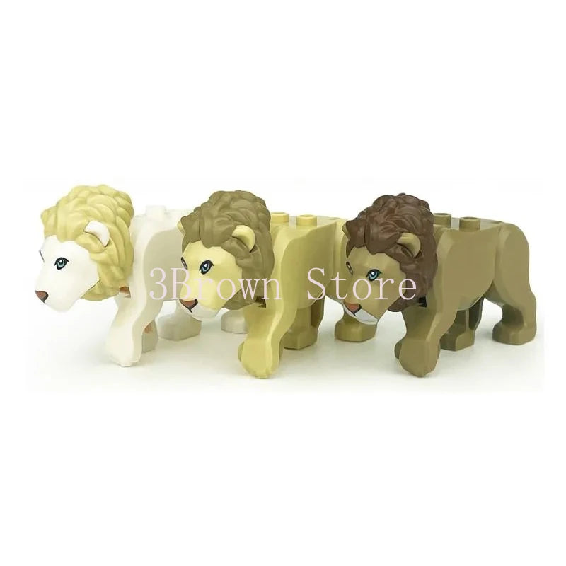 A set of six wooden building blocks shaped like African wildlife animals, including lions and a white animal.
