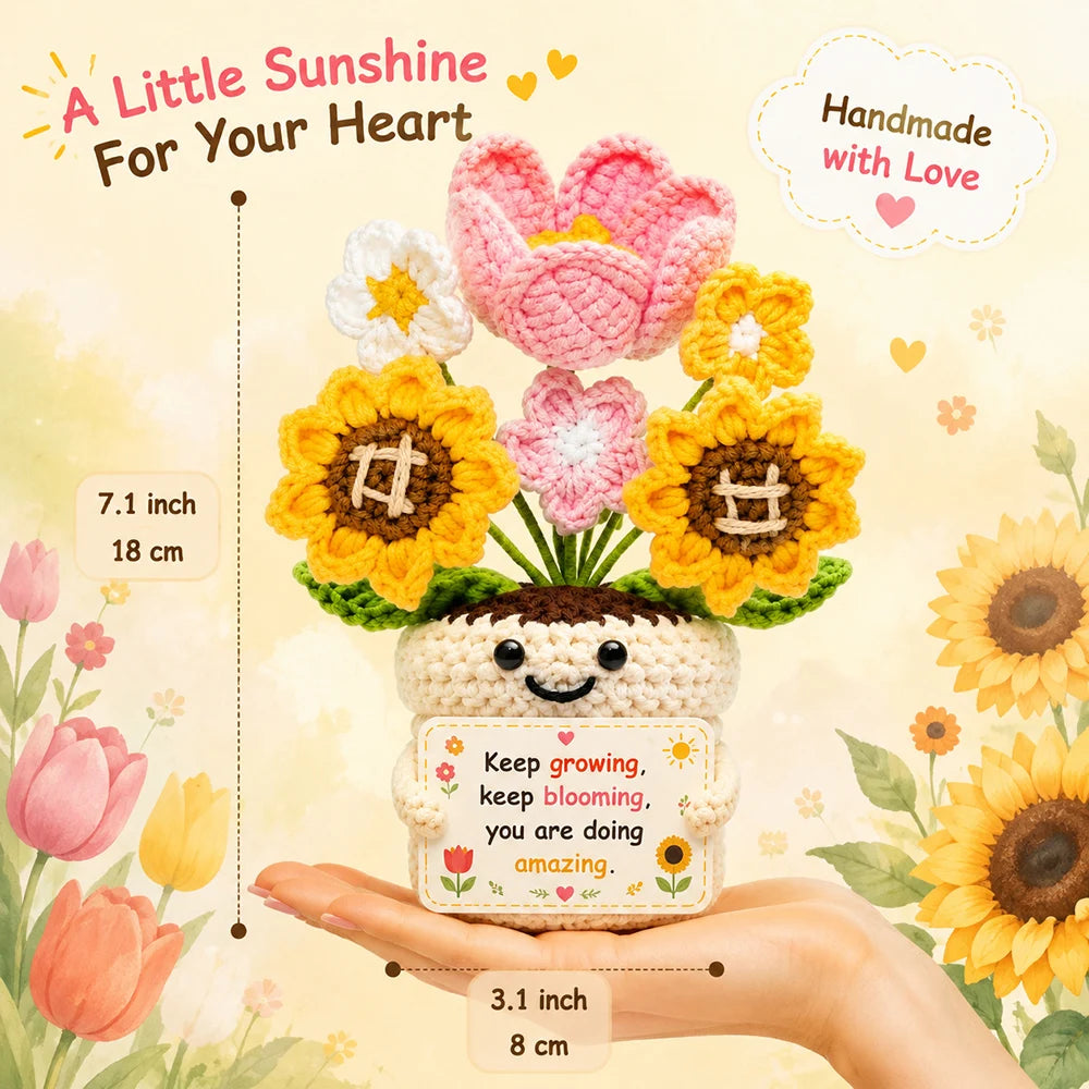Handmade crochet flower arrangement with a motivational card displayed in a hand.