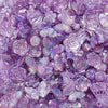 Close-up of iridescent purple butterfly shell acrylic beads used for DIY jewelry making