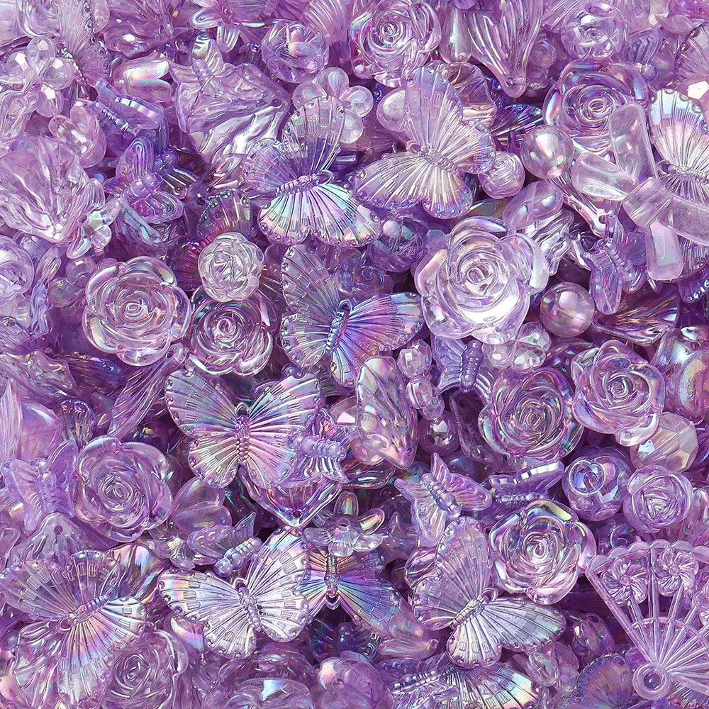 Close-up of iridescent purple butterfly shell acrylic beads used for DIY jewelry making