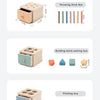 Three wooden Montessori boxes for sorting sticks, building blocks, and pitching balls.