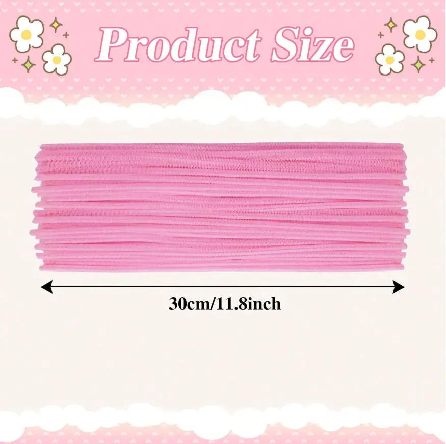 A display showing pink chenille craft pipe cleaners laid out horizontally with a dimension marker.
