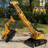 A yellow remote control construction excavator truck is shown operating on a concrete surface.