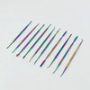 A set of ten colorful stainless steel clay sculpting tools arranged diagonally on a white background.