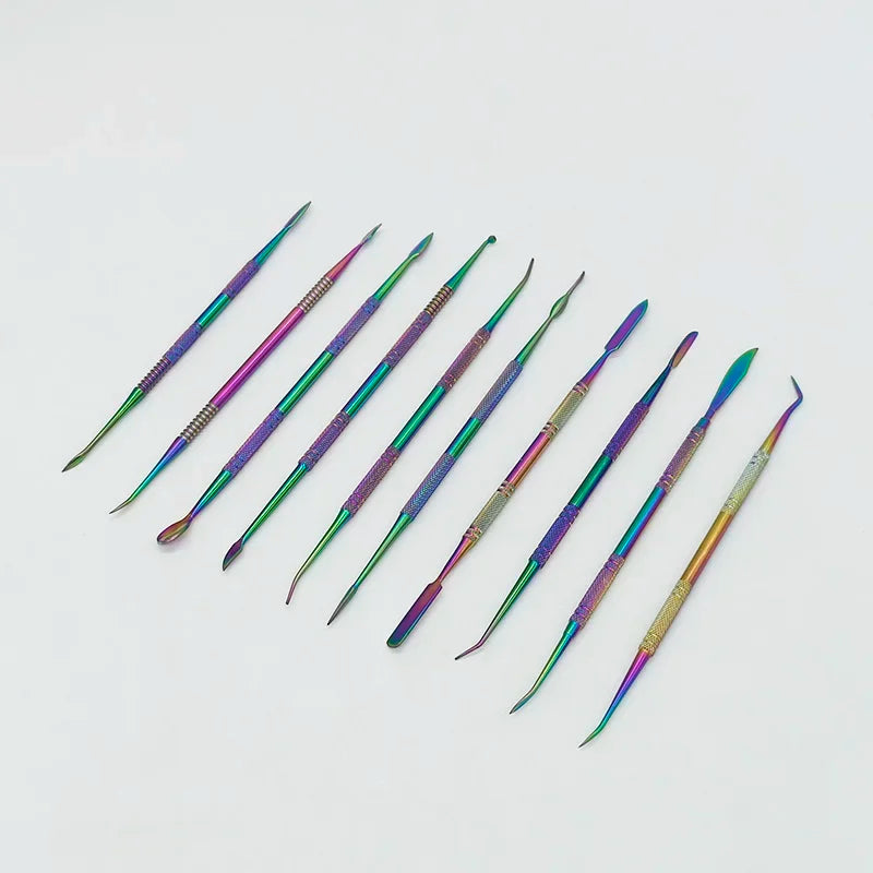 A set of ten colorful stainless steel clay sculpting tools arranged diagonally on a white background.