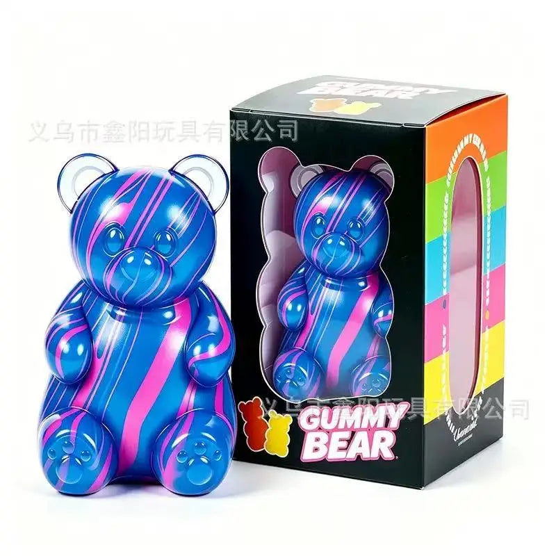 A purple and blue gummy bear squeeze toy in its packaging box.