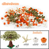 A set of building blocks featuring cherry blossom themed pieces, including a tree and various colored flowers.